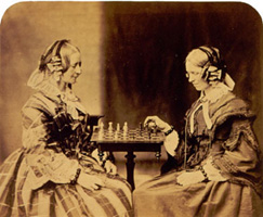 Two of Lewis Carroll's aunts playing chess on a small table.